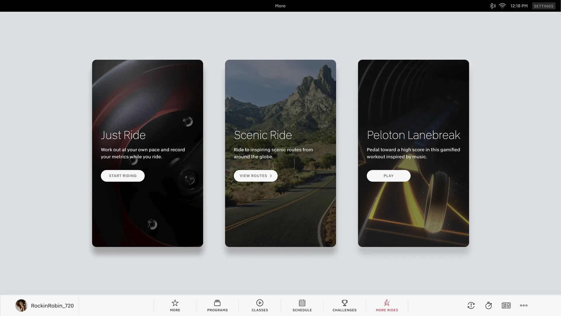 Peloton app ride-selection screen showing Just Ride, Scenic Ride, and Peloton Lanebreak.
